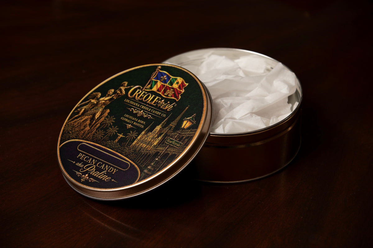 Creole-ish Louisiana Creole Candy Co. collector's tin, pecan candy aka praline, lid resting on the open tin